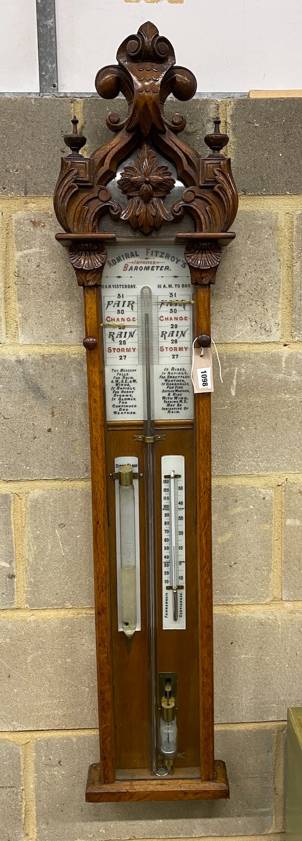 A Victorian carved oak cased Admiral Fitzroy barometer, height 120cm